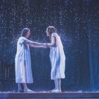 Indecent - raining on two women on a stage